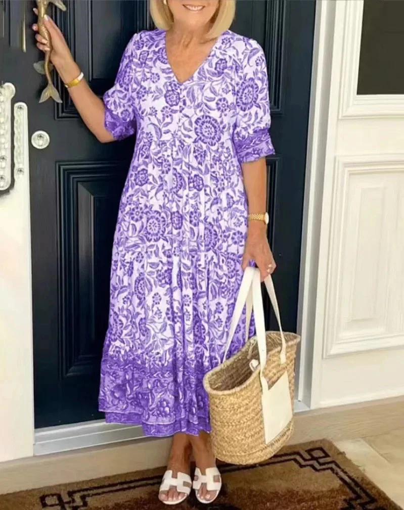 Jennica - Elegant floral dress with V-neckline